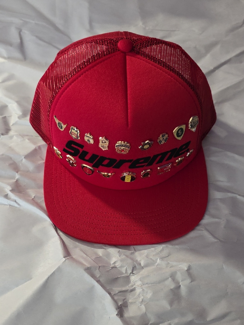 Brand New with Tags Supreme Pins Mesh Back 5 Panel Red Trucker Cap Gold Accents.